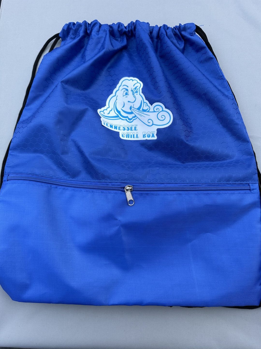 A blue color bag on a white background