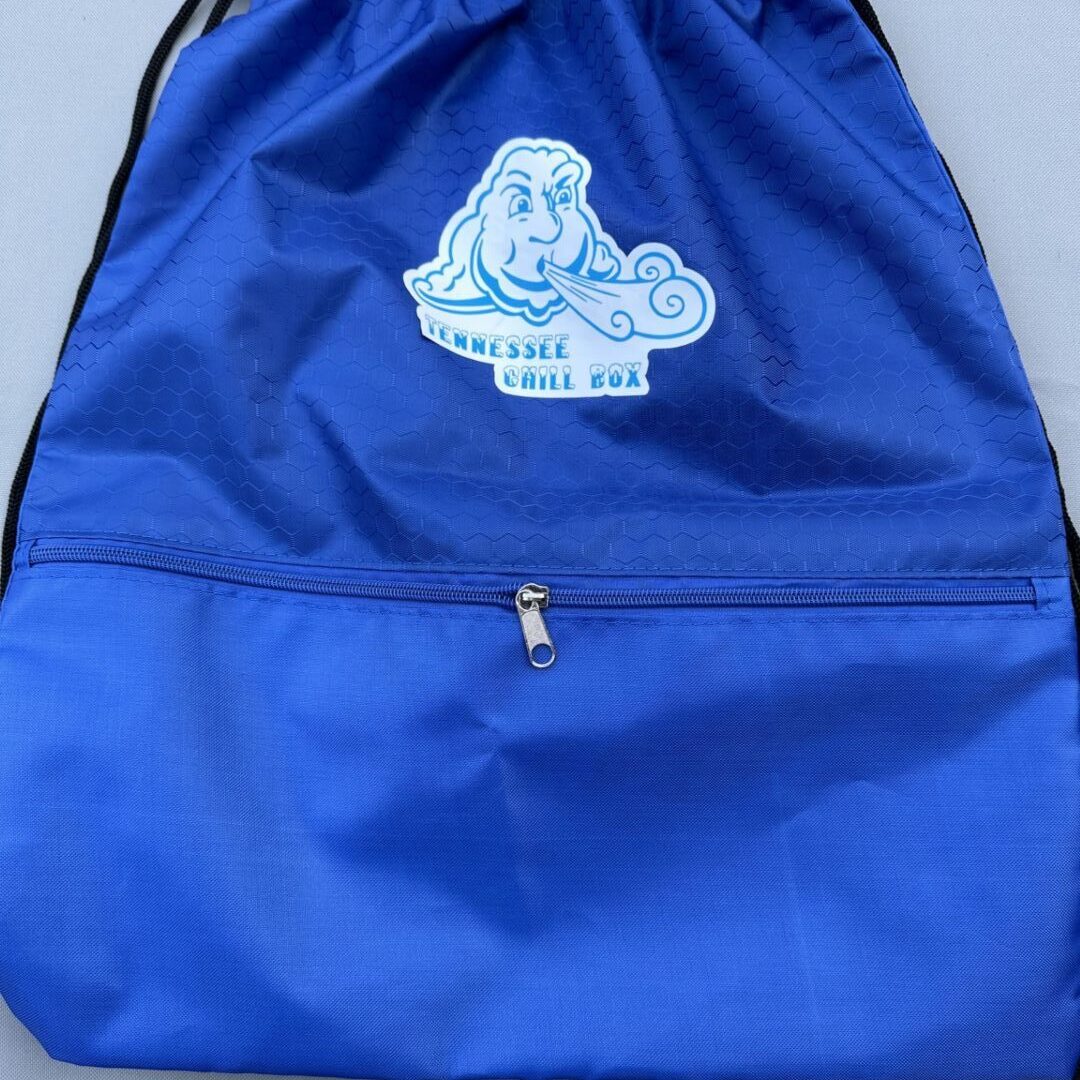 A blue bag with a picture of a woman on it.