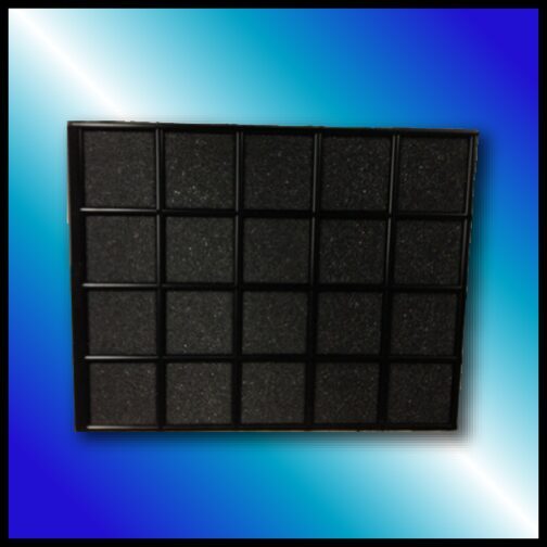 A black tray with many squares of different sizes.